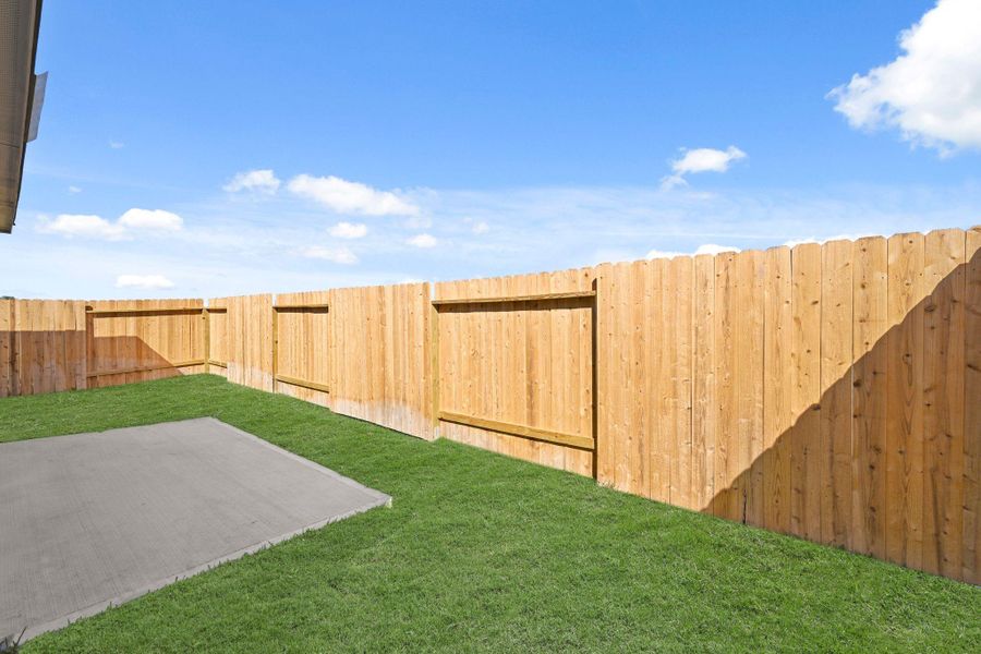 Exterior details and patio area of a home in Northpark South, Porter (Image 2). Exterior details and patio area of a home in Northpark South, Porter (Image 2).