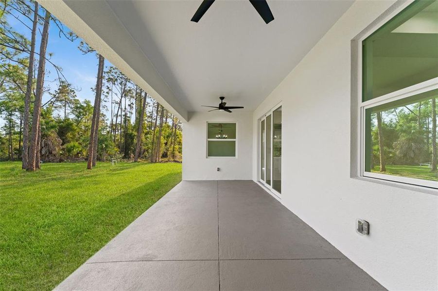 Exterior details and patio area of a home in , North Port (Image 25).