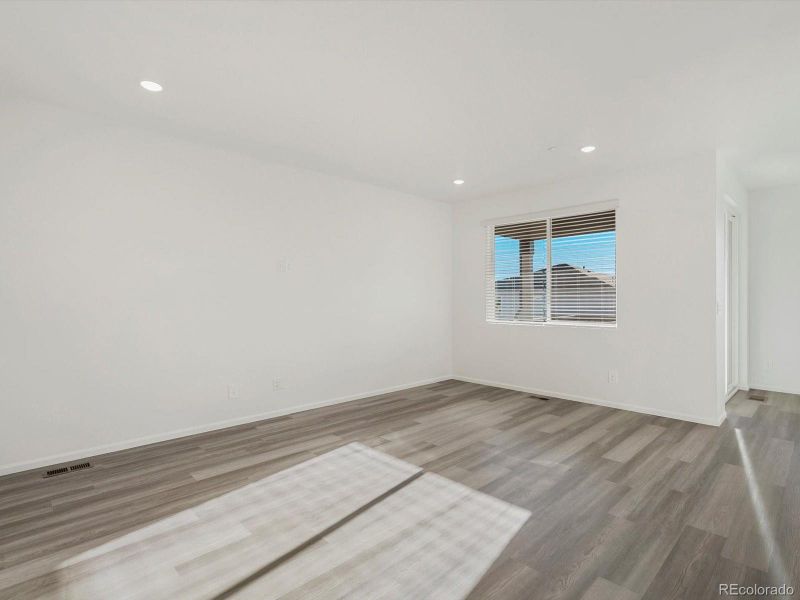 Spacious, unfurnished interior of a new home in Buffalo Highlands: The Flora Collection, Commerce City (Image 12).