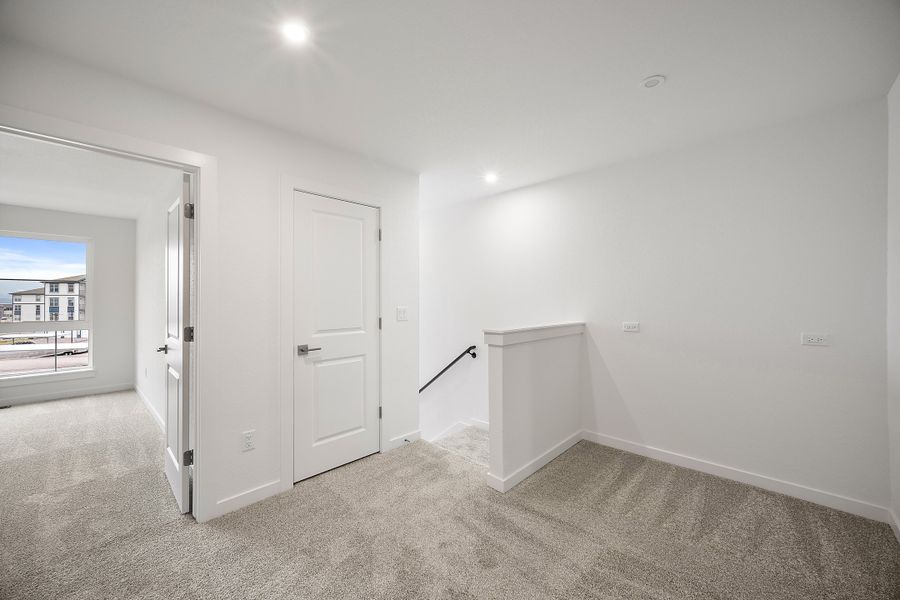 Representative unfurnished interior of a home built from the Nolan by Lokal Homes in The Commons at Victory Ridge, Colorado Springs (Image 17).