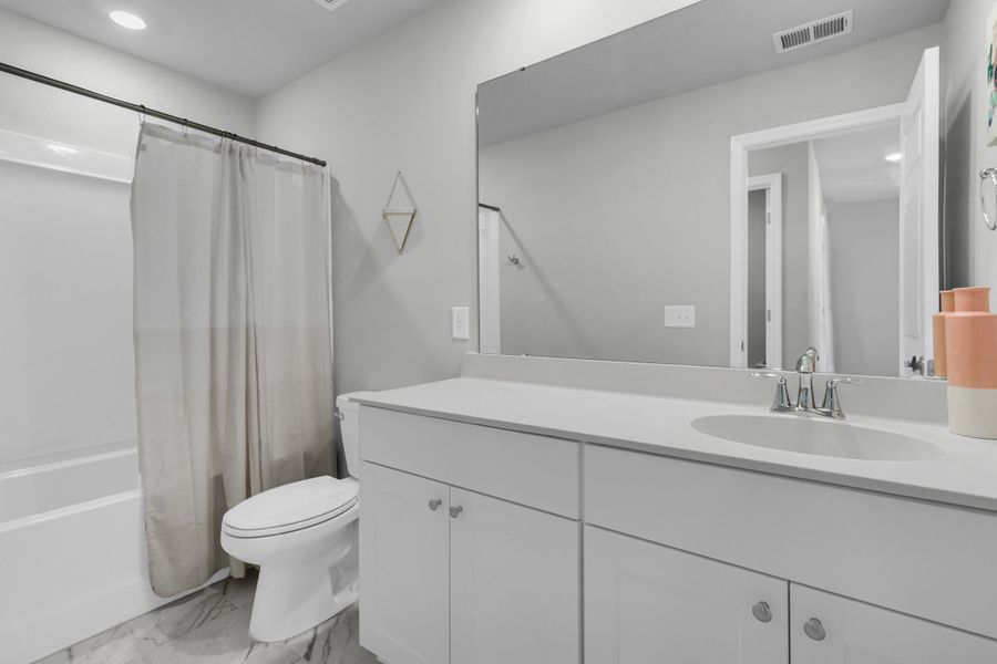 Furnished interior view inside a new home in Sweetgrass at Summers Corner: Arbor Collection, Summerville (Image 12). Furnished interior view inside a new home in Sweetgrass at Summers Corner: Arbor Collection, Summerville (Image 12).