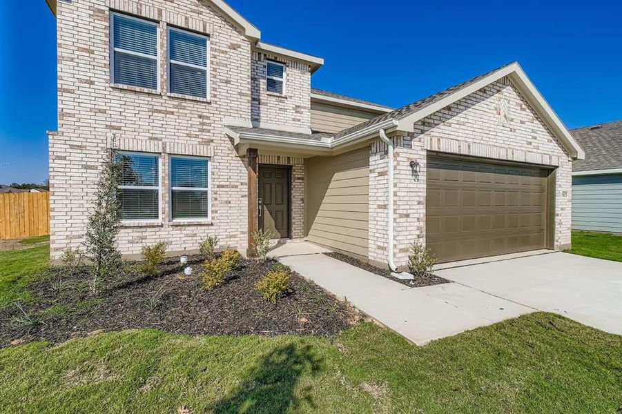 Front exterior of a new home in Middlefield Village, Dallas, TX, highlighting curb appeal (Image 18).