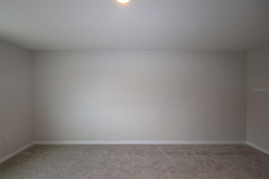 Spacious, unfurnished interior of a new home in Reeves Place, Orlando (Image 21).