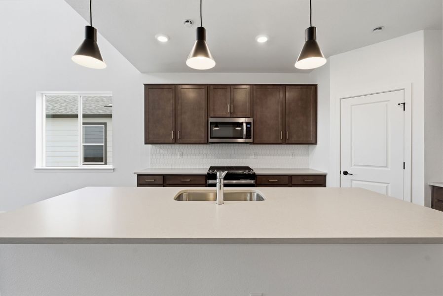 Furnished interior view inside a new home in Harvest Crossing, Aurora (Image 12).