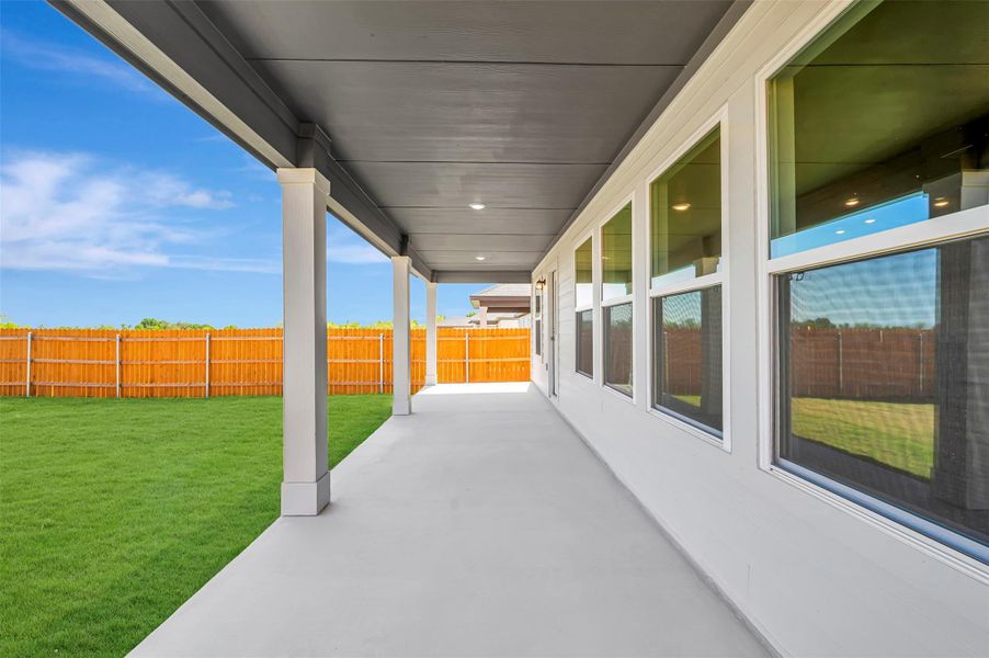 Exterior details and patio area of a home in Carillon, Manor (Image 3).