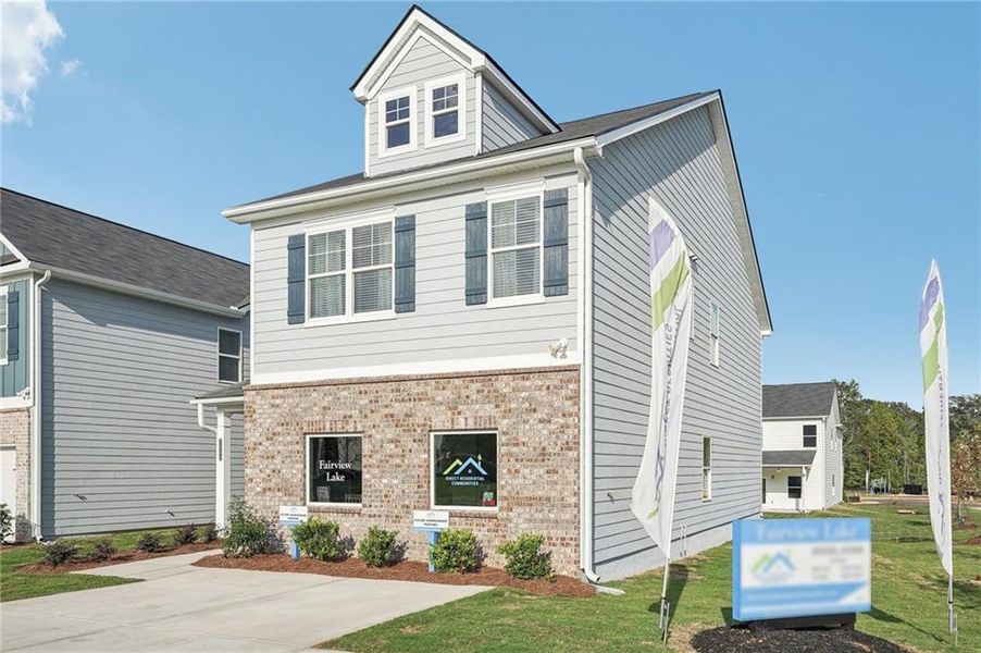 Front exterior of a new home in Vickers Point - Single Family, Fairburn, GA, highlighting curb appeal (Image 27). Front exterior of a new home in Vickers Point - Single Family, Fairburn, GA, highlighting curb appeal (Image 27).