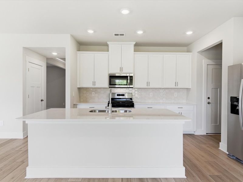 Furnished interior view inside a new home in Crossing at Abner Creek, Greer (Image 3).