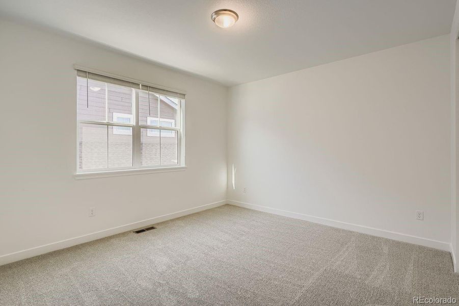 Spacious, unfurnished interior of a new home in Macanta: The Grand Collection, Castle Rock (Image 11).