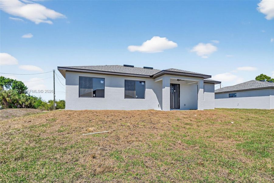 Exterior details and patio area of a home in , Lehigh Acres (Image 3).