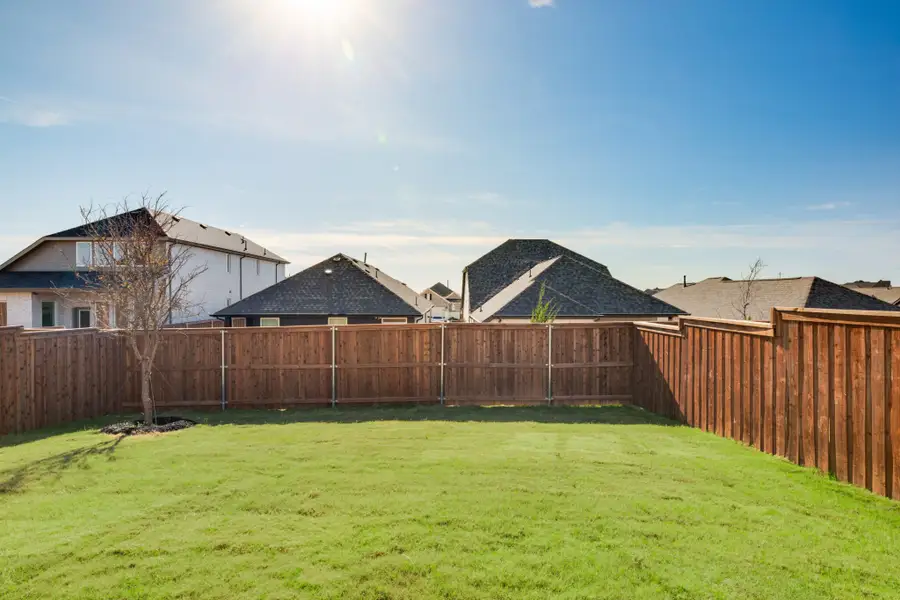 Exterior details and patio area of a home in Reunion, Rhome (Image 3). Exterior details and patio area of a home in Reunion, Rhome (Image 3).