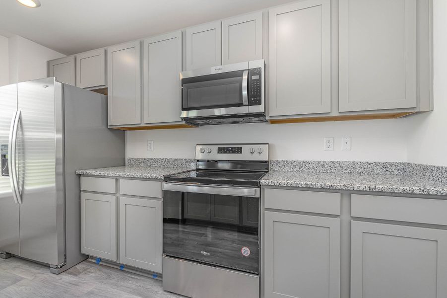 Representative furnished interior of a home built from the PENWELL by D.R. Horton in South Haven, Camden (Image 9).