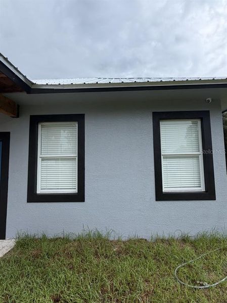Exterior details and patio area of a home in , Okeechobee (Image 24).