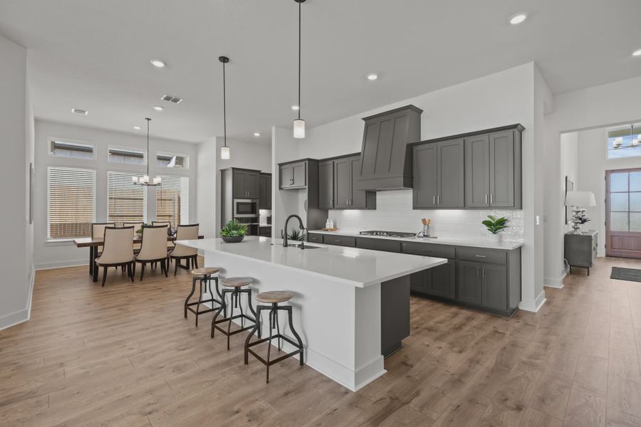 Representative furnished interior of a home built from the Silas by Chesmar Homes in 6 Creeks, Kyle (Image 6).