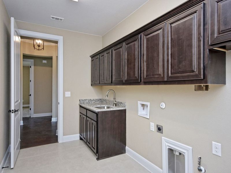 Representative furnished interior of a home built from the Madera II by Giddens Homes in Scofield Farms Estates, Georgetown (Image 221).
