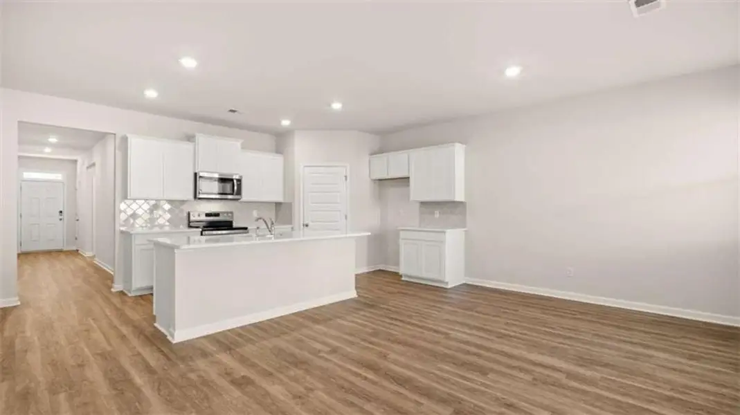 Furnished interior view inside a new home in Oakchase at Hampton, Hampton (Image 6). Furnished interior view inside a new home in Oakchase at Hampton, Hampton (Image 6).