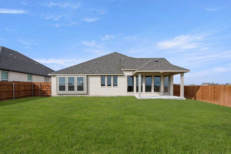 Exterior details and patio area of a home in Chapel Ridge, Waco (Image 4).
