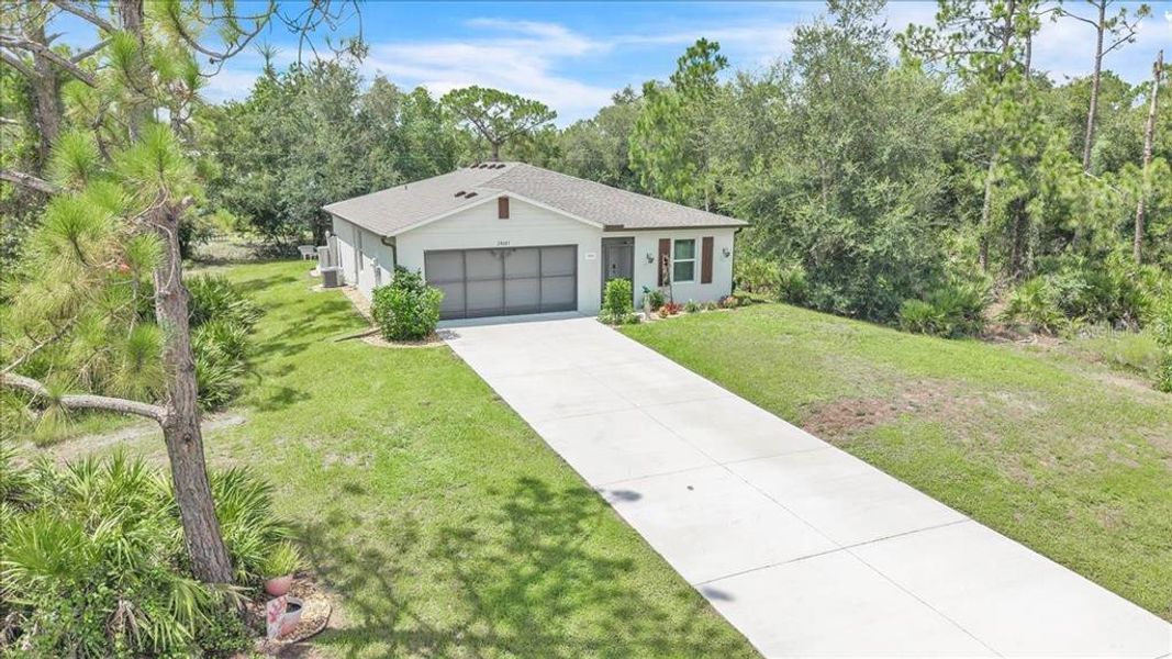 Front exterior of a new home in , Punta Gorda, FL, highlighting curb appeal (Image 24). Front exterior of a new home in , Punta Gorda, FL, highlighting curb appeal (Image 24).