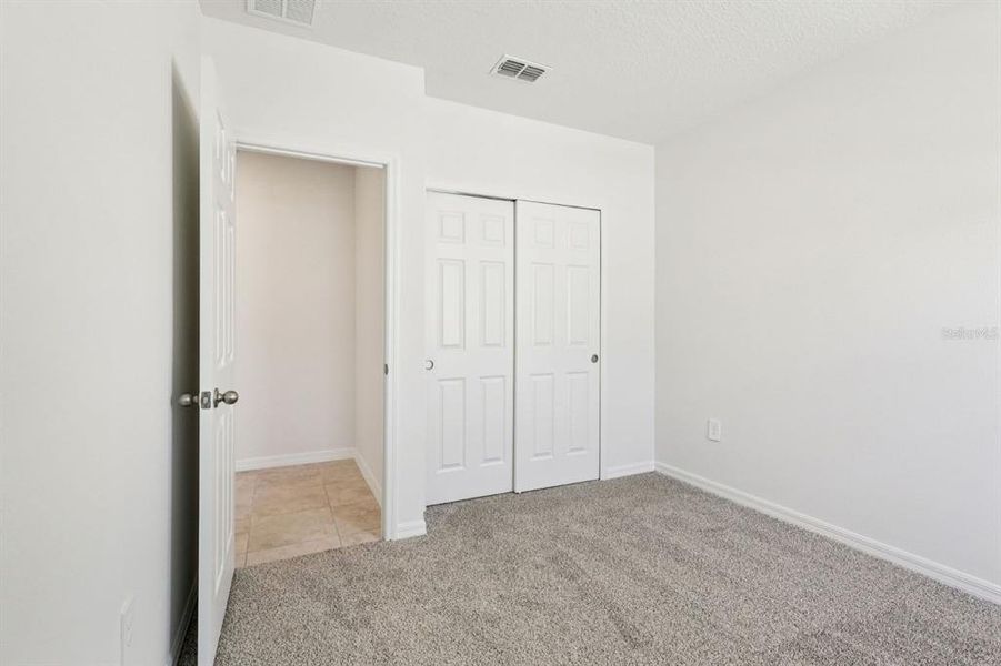 Spacious, unfurnished interior of a new home in Springs at Lake Alfred - Classic Series, Lake Alfred (Image 16).