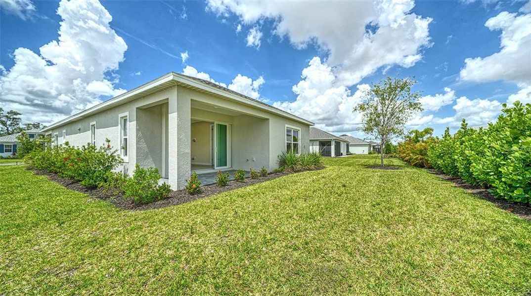 Exterior details and patio area of a home in Wildleaf at North River Ranch, Parrish (Image 20).