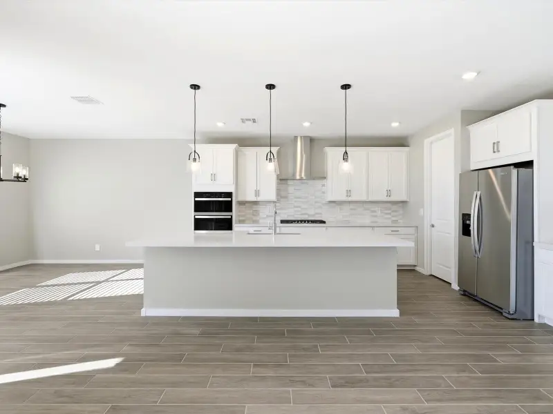 Furnished interior view inside a new home in White Tank Foothills Signature Series, Waddell (Image 3).