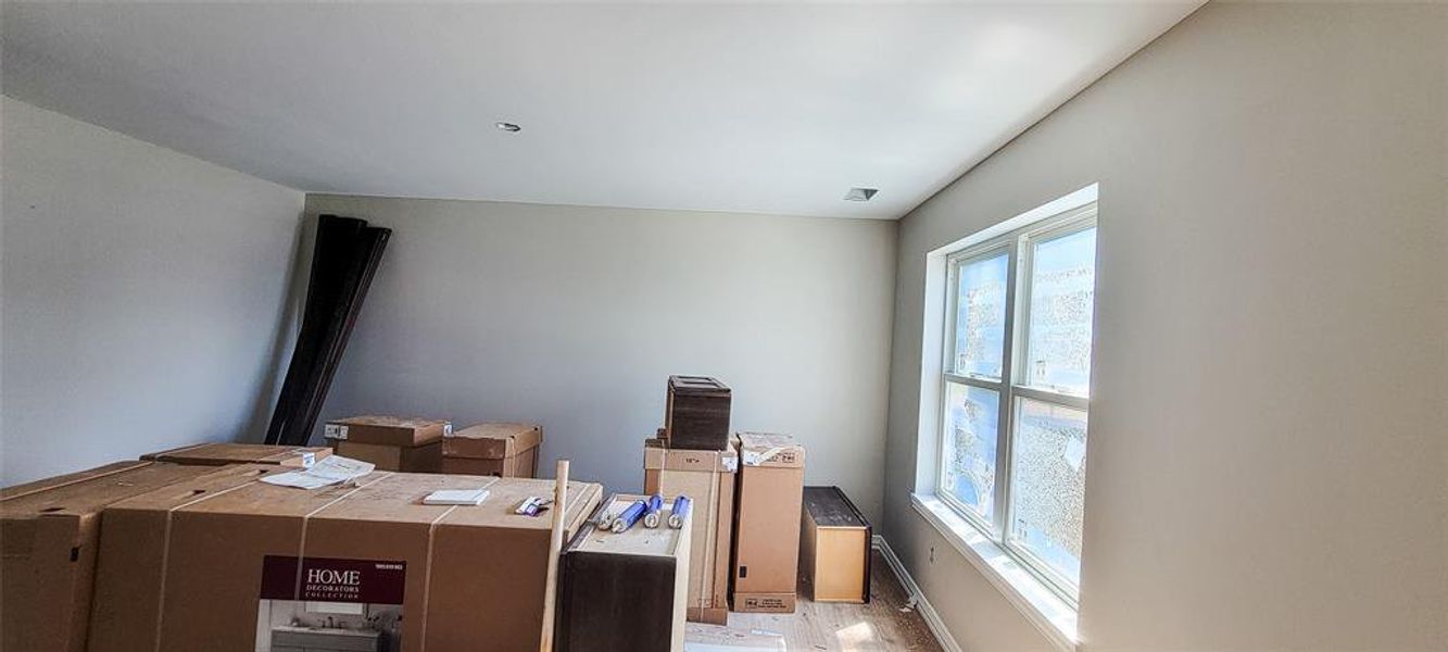 Office area featuring light hardwood / wood-style floors