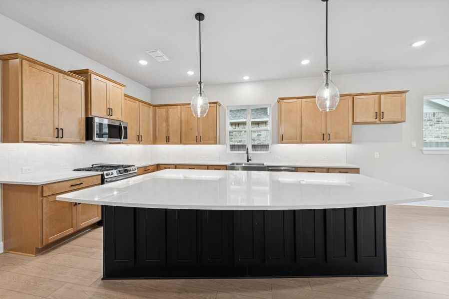 Furnished interior view inside a new home in Meridiana 55' Homesites, Manvel (Image 8).