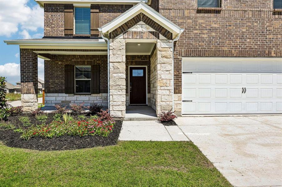 Exterior details and patio area of a home in Lakehaven - Signature Series, Farmersville (Image 2). Exterior details and patio area of a home in Lakehaven - Signature Series, Farmersville (Image 2).