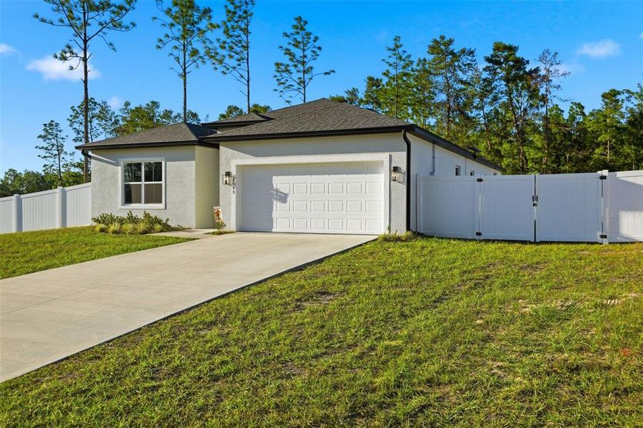 Front exterior of a new home in , Ocala, FL, highlighting curb appeal (Image 27). Front exterior of a new home in , Ocala, FL, highlighting curb appeal (Image 27).