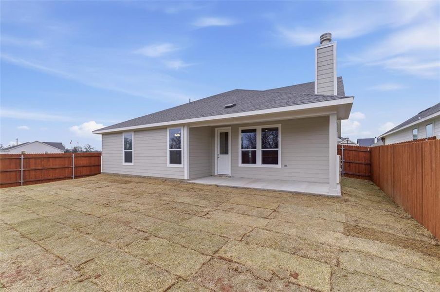 Exterior details and patio area of a home in Covenant Park, Springtown (Image 18).