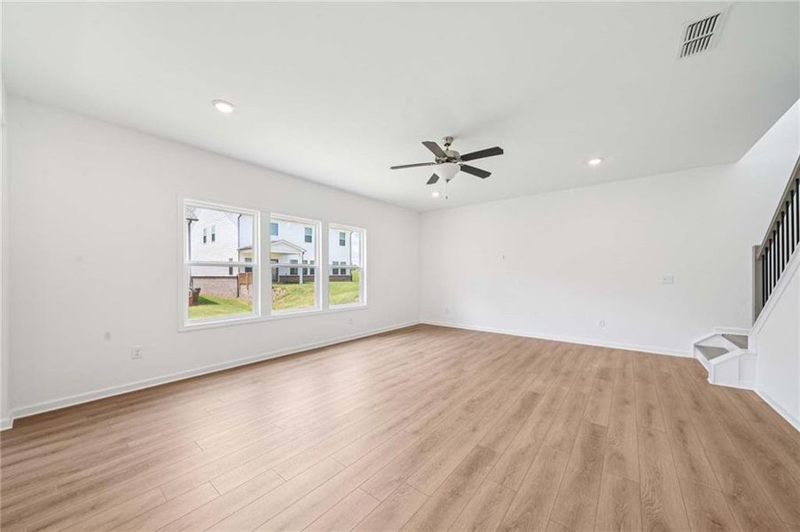 Spacious, unfurnished interior of a new home in Eastlyn Crossing, Flowery Branch (Image 13).