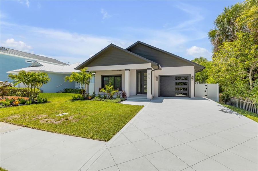 Front exterior of a new home in , New Smyrna Beach, FL, highlighting curb appeal (Image 30). Front exterior of a new home in , New Smyrna Beach, FL, highlighting curb appeal (Image 30).