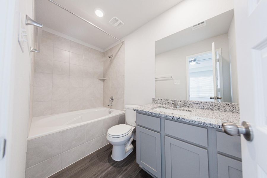 Furnished interior view inside a new home in River's Edge, Conroe (Image 6).