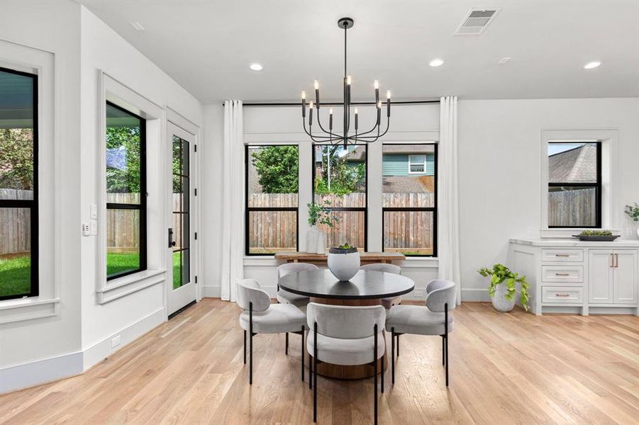 Breakfast area open wide and able to accommodate a large table.