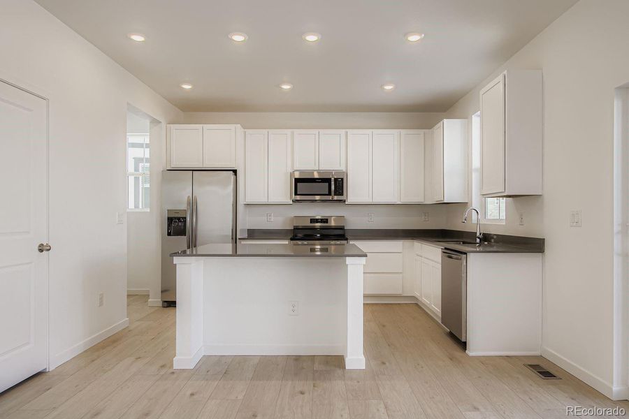 Furnished interior view inside a new home in Ken-Caryl Ranch, Littleton (Image 4).
