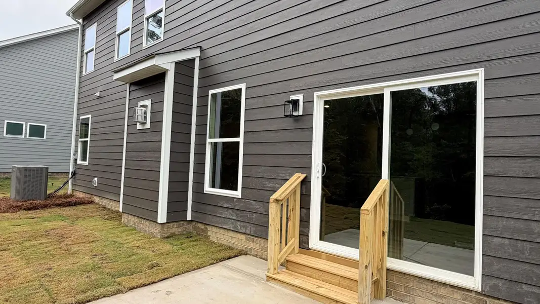 Exterior details and patio area of a home in Waterford Commons, Rock Hill (Image 2). Exterior details and patio area of a home in Waterford Commons, Rock Hill (Image 2).