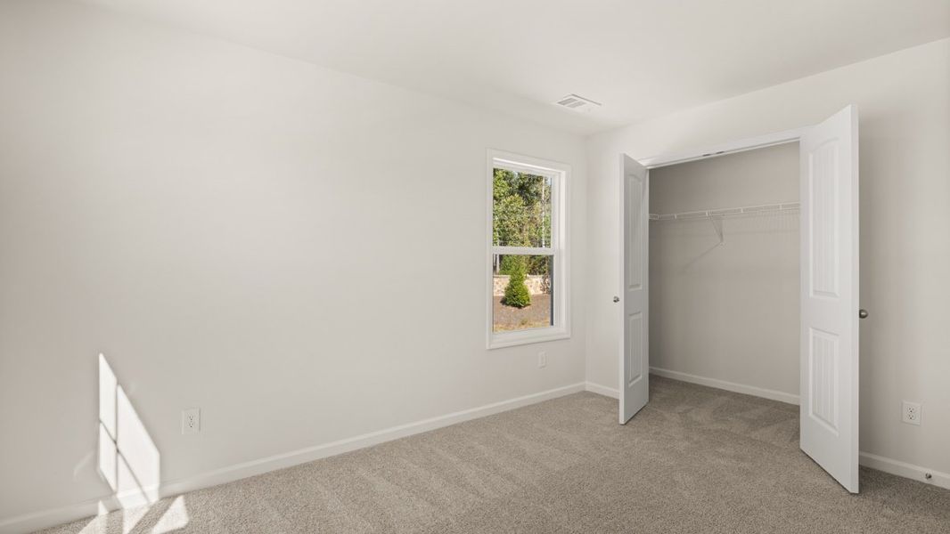 Representative unfurnished interior of a home built from the WINDSOR by D.R. Horton in Butner Estates, South Fulton (Image 59).