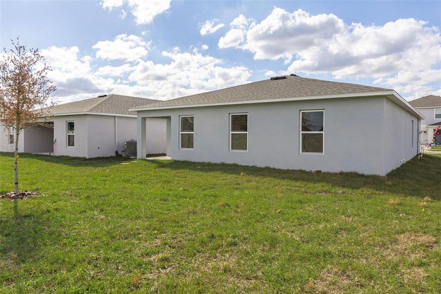 Exterior details and patio area of a home in The Grove at Scenic Terrace, Lake Hamilton (Image 4).
