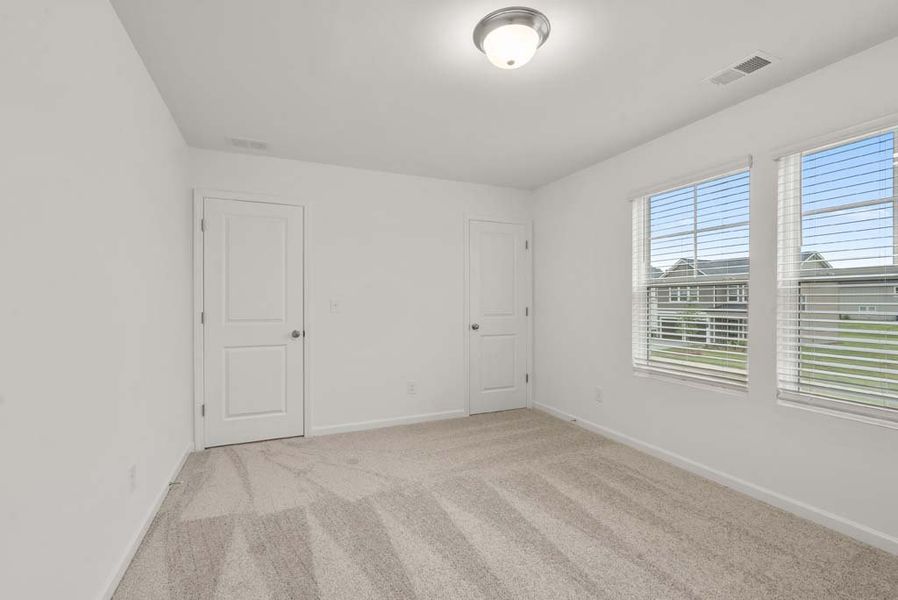 Representative unfurnished interior of a home built from the Baker by Ashton Woods in Langston Reserve, Cartersville (Image 29).