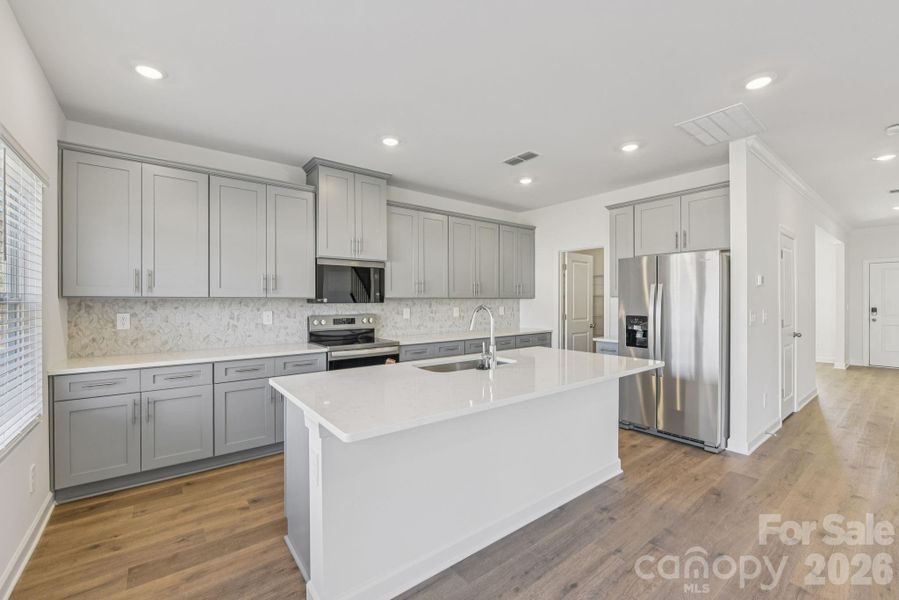 Photo is not of the actual home, but is an inspirational photo of builder’s model home and may depict options, furnishings, and/or decorator features that are not included