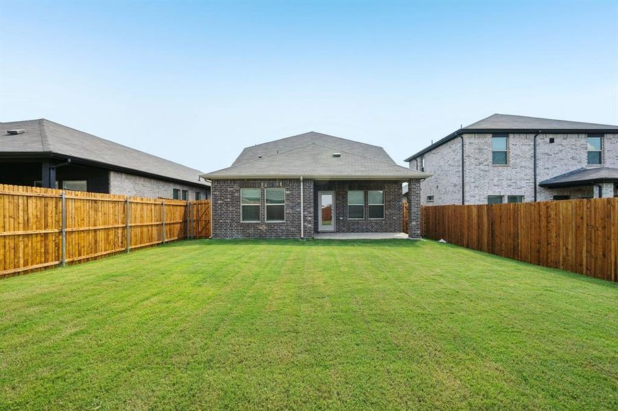 Exterior details and patio area of a home in Simpson Crossing - Spring Series, McKinney (Image 21).