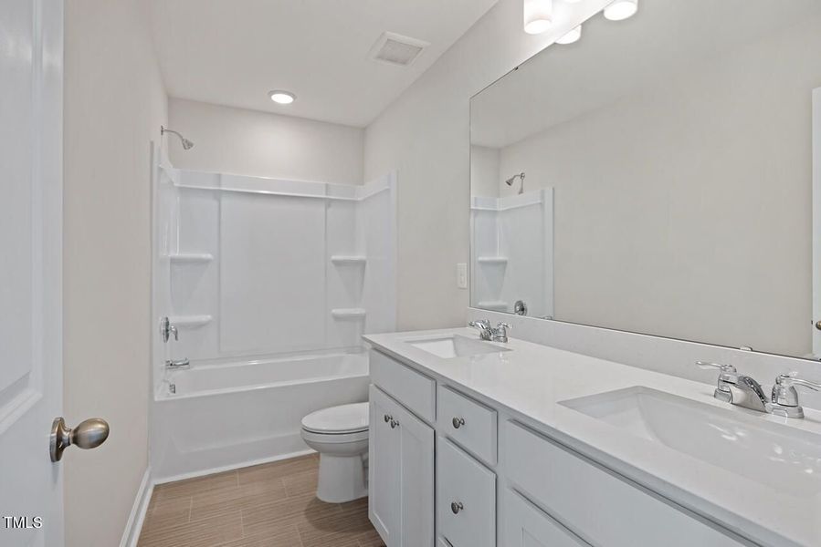 Furnished interior view inside a new home in Springvale, Fuquay Varina (Image 9).
