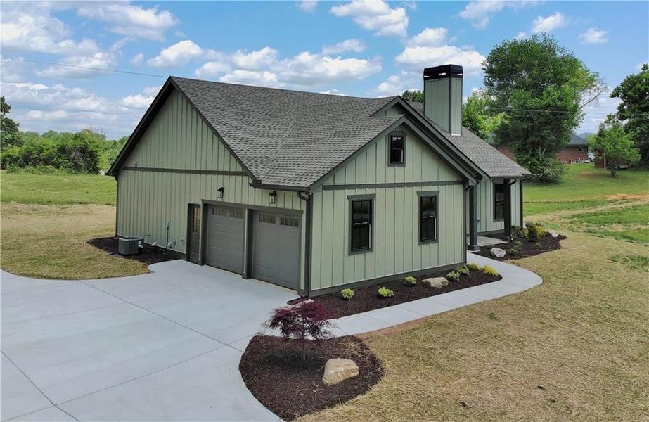 Front exterior of a new home in , Morganton, GA, highlighting curb appeal (Image 21).