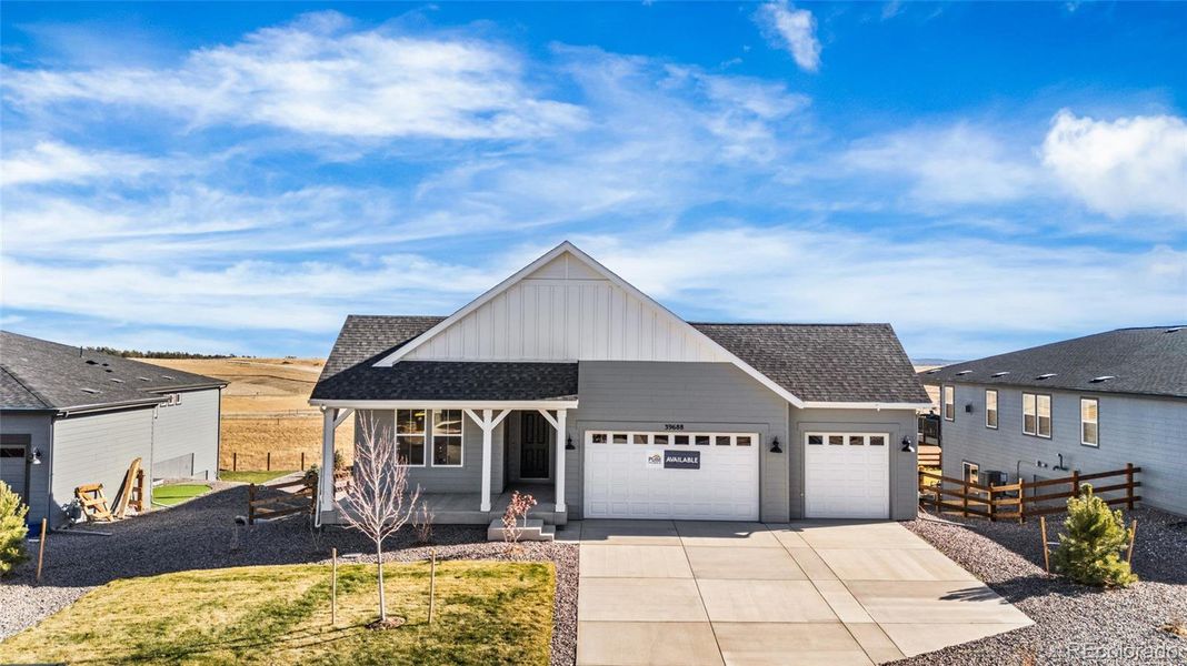 Front exterior of a new home in Independence, Elizabeth, CO, highlighting curb appeal (Image 15). Front exterior of a new home in Independence, Elizabeth, CO, highlighting curb appeal (Image 15).