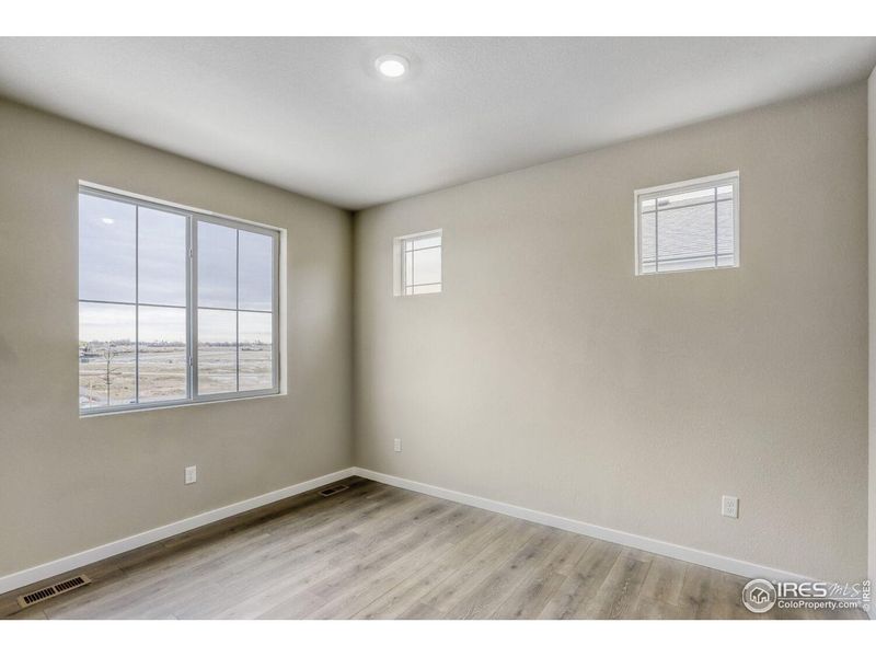 Spacious, unfurnished interior of a new home in Farmstead, Berthoud (Image 35).