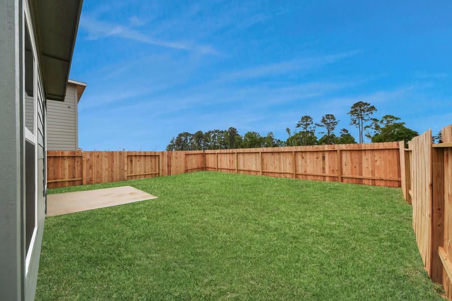 Exterior details and patio area of a home in The Enclave at Spring Branch, Montgomery (Image 17). Exterior details and patio area of a home in The Enclave at Spring Branch, Montgomery (Image 17).