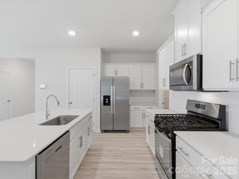 Furnished interior view inside a new home in Reedy Creek Preserve, Charlotte (Image 9).