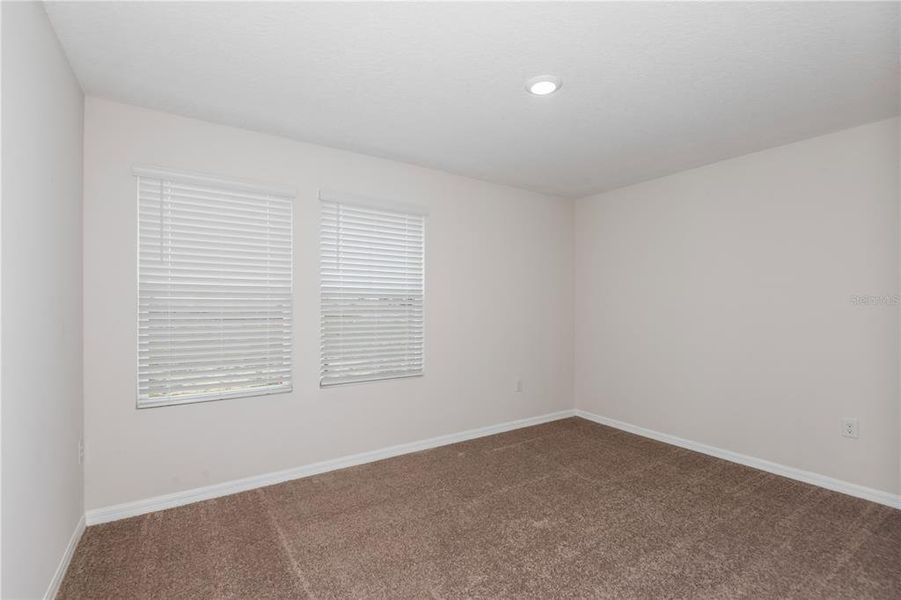 Spacious, unfurnished interior of a new home in Pasadena Woods, Dade City (Image 14).