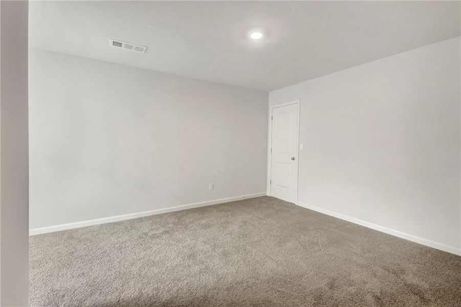 Spacious, unfurnished interior of a new home in Butner Estates, College Park (Image 25).