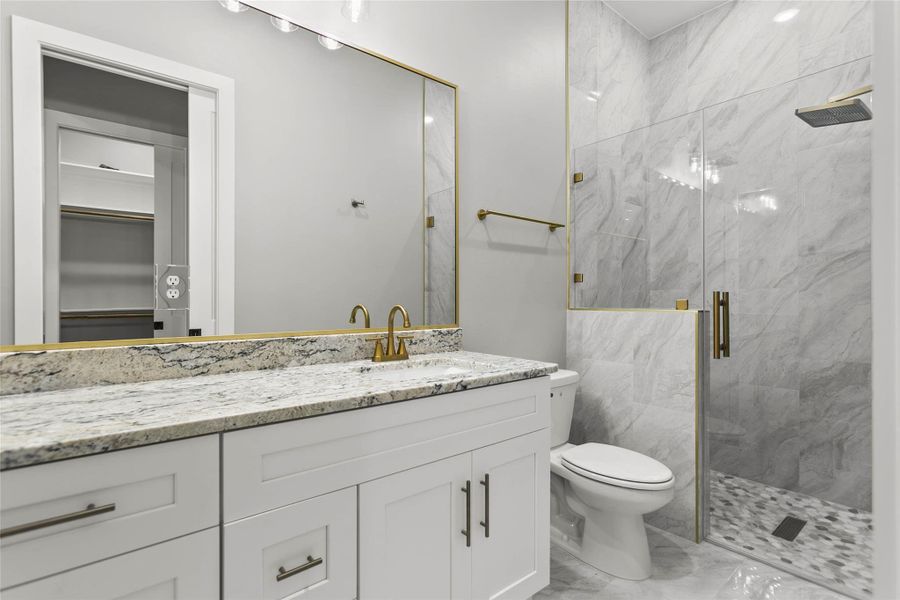 The large en-suite bath for the second primary bedroom. The large en-suite bath for the second primary bedroom.