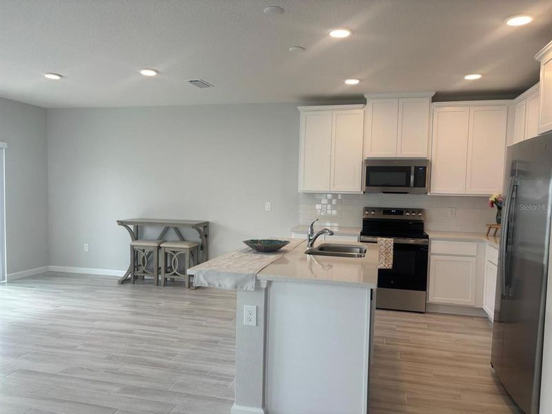 Furnished interior view inside a new home in , Orlando (Image 3).